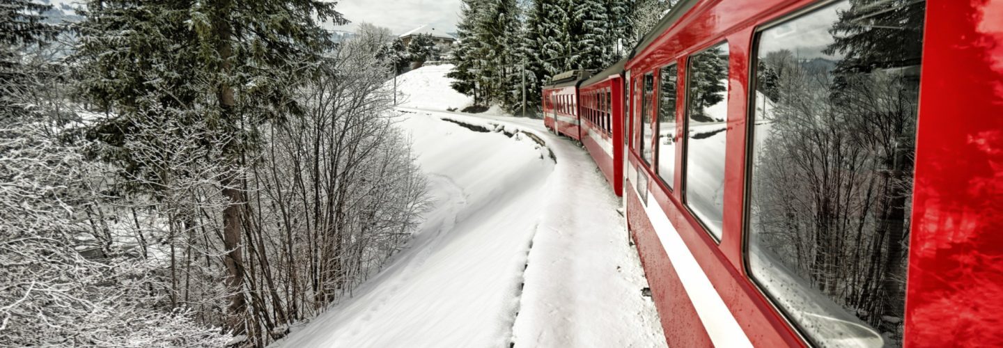 Swiss train in snow assalve