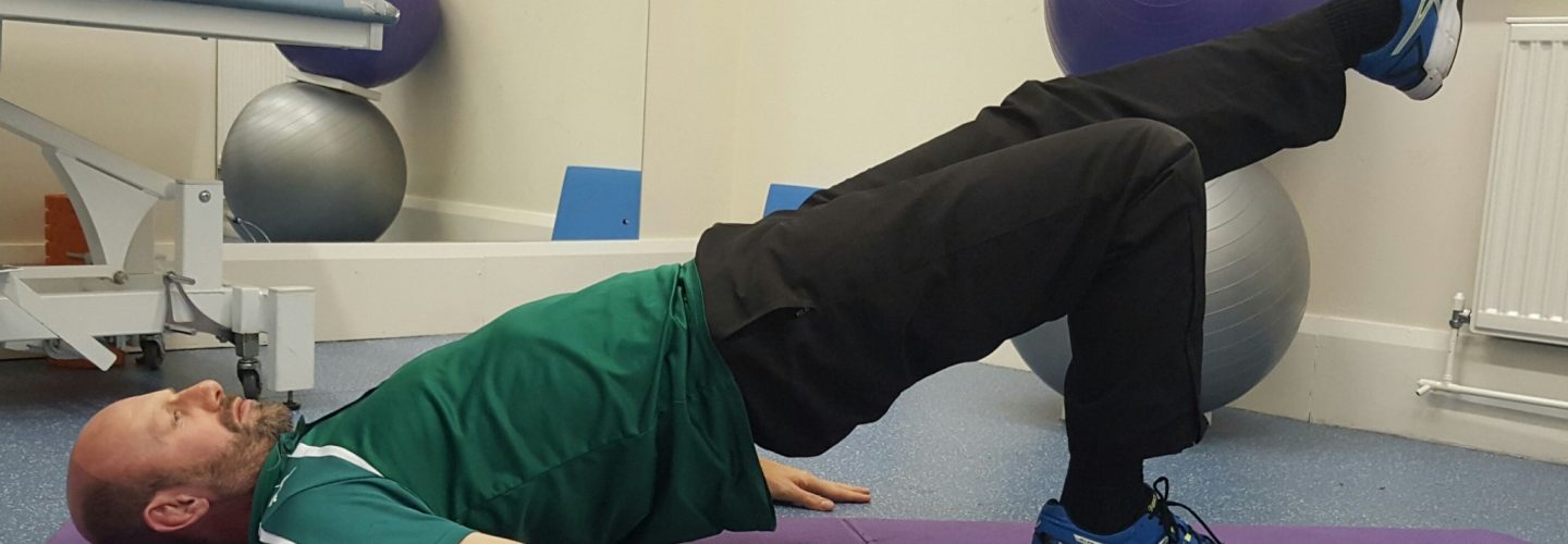 Shoulder bridge leg raised