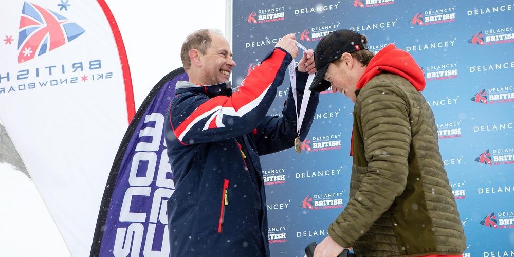 HRH Earl of Wessex Prince Edward Delancey British Alpine Ski Champs 2017 giving out medal to GB Parasnowsport athlete Josh Landmann