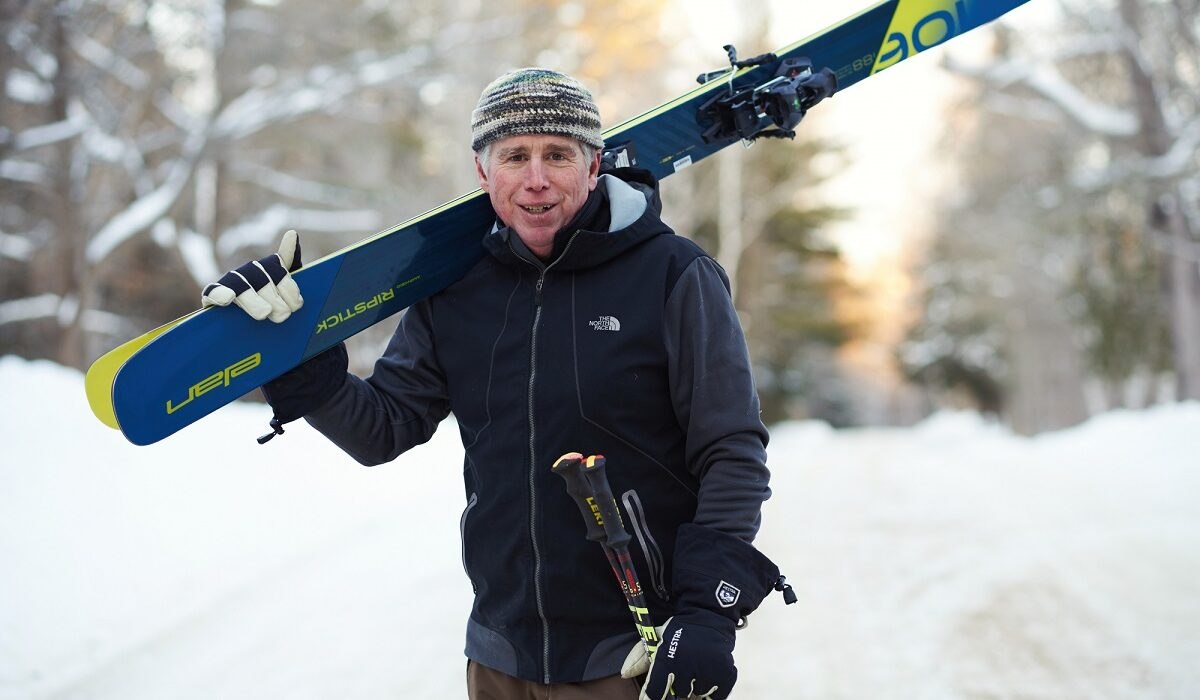Dan Egan with skis