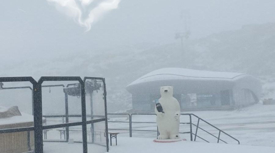 Snow-covered ski slope in the Alps after fresh September snowfall 2025